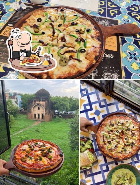 Try out pizza at Spaced Out Cafe