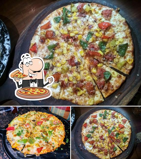 Get pizza at The litup cafe