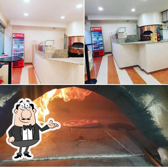 La immagine di interni e cibo da Pizzeria Vesuvio (via Roma ang. piazza gramsci)