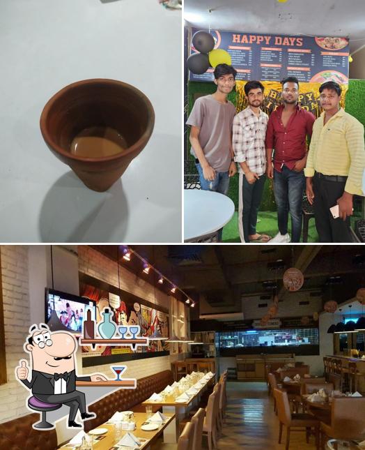 The photo of interior and food at Happy day restaurant