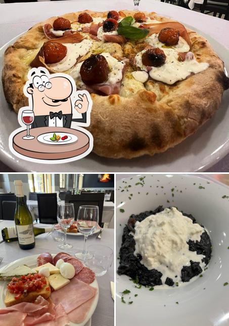Ristorante Pizzeria Andromeda si caratterizza per la cibo e esterno