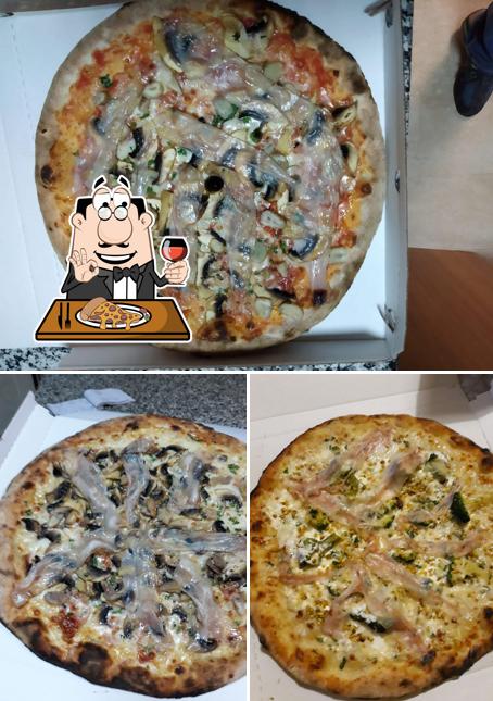 A Pizzeria Portavia Di Liggia Marina, puoi assaggiare una bella pizza