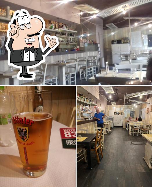 Questa è la foto che presenta la interni e birra di Pizzeria “Zì Nenè”