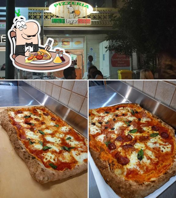 Prenditi una pizza a Pizzeria la piazzetta