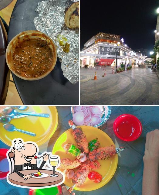 Check out the image depicting food and exterior at Rasoi deliver (Pure veg)