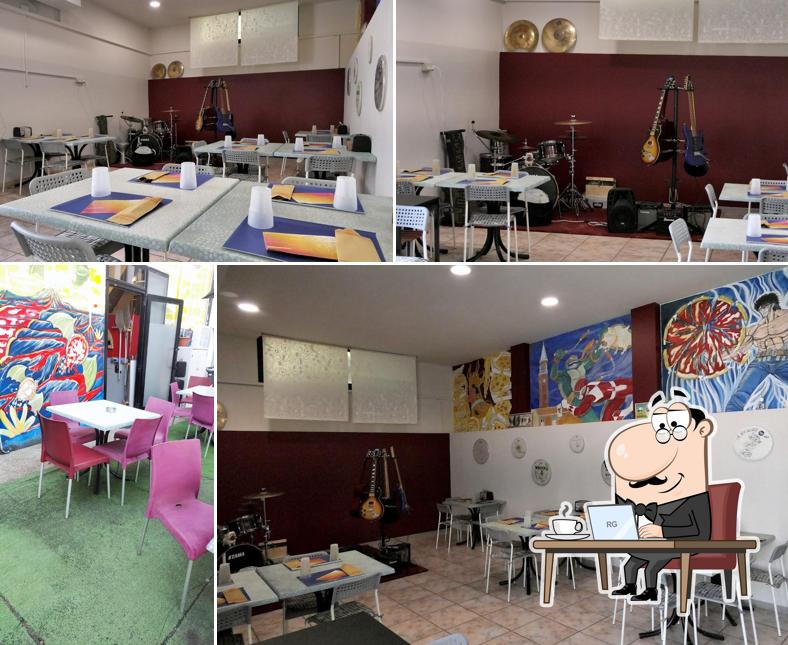 Dai un'occhiata agli interni di Rock'in Pizza