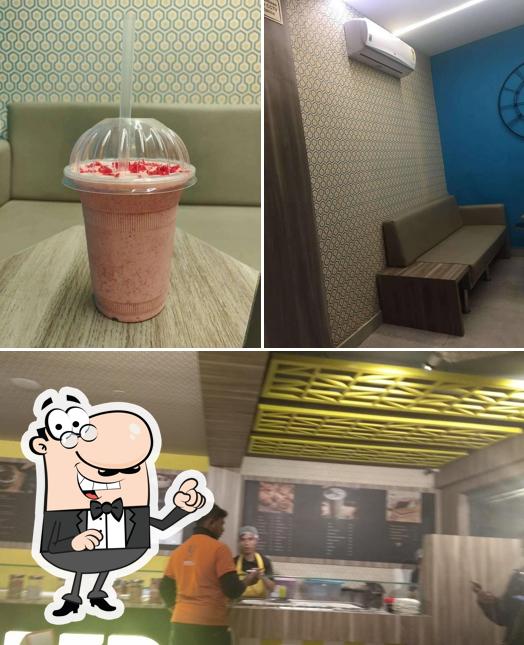 This is the image displaying interior and drink at Scooped