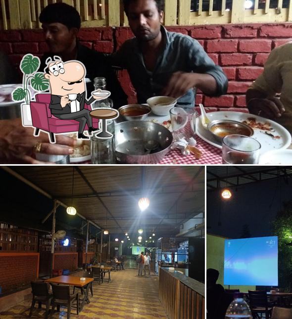 Take a seat at one of the tables at 9th Mile Hotel