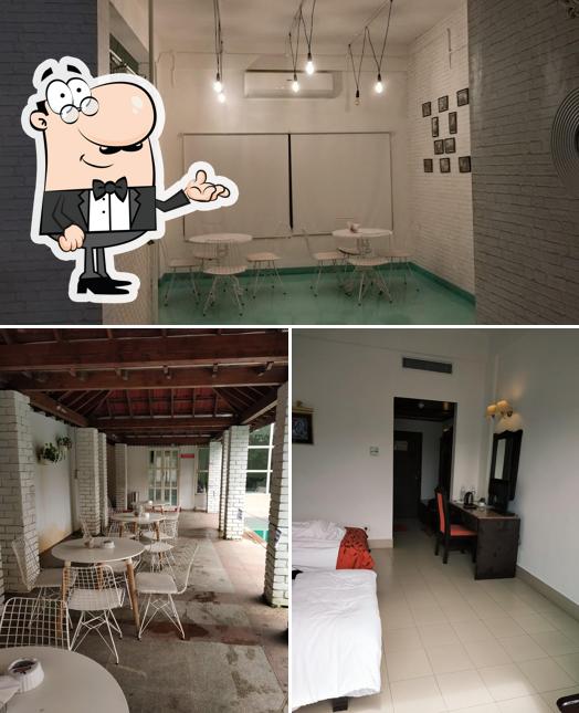 Take a seat at one of the tables at Hotel Sopanam Heritage