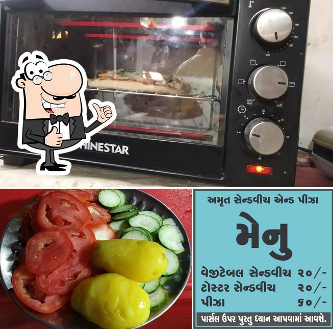 Look at the pic of AMRUT SANDWICH & PIZZA