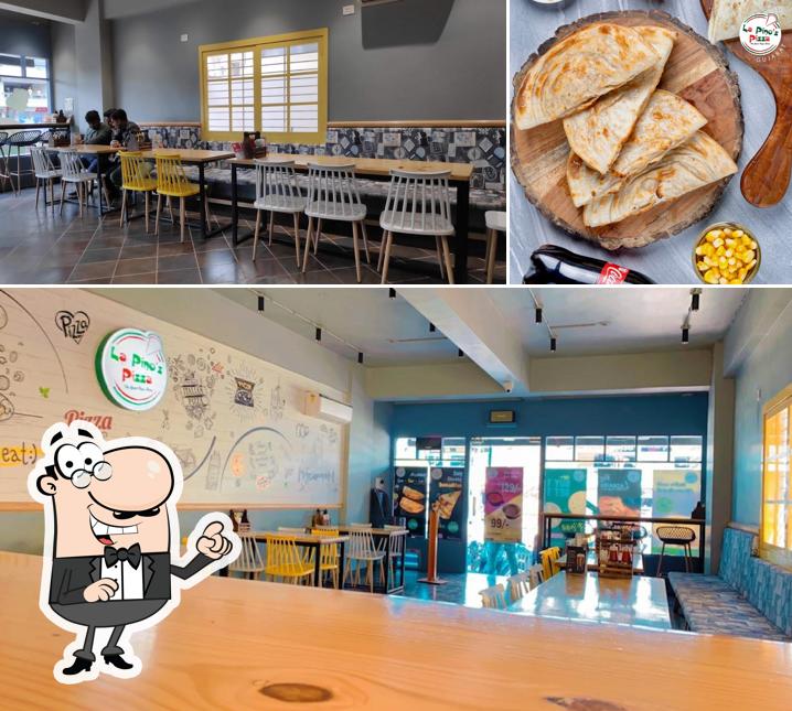 Check out the picture displaying interior and food at La Pino'z Pizza Junagadh