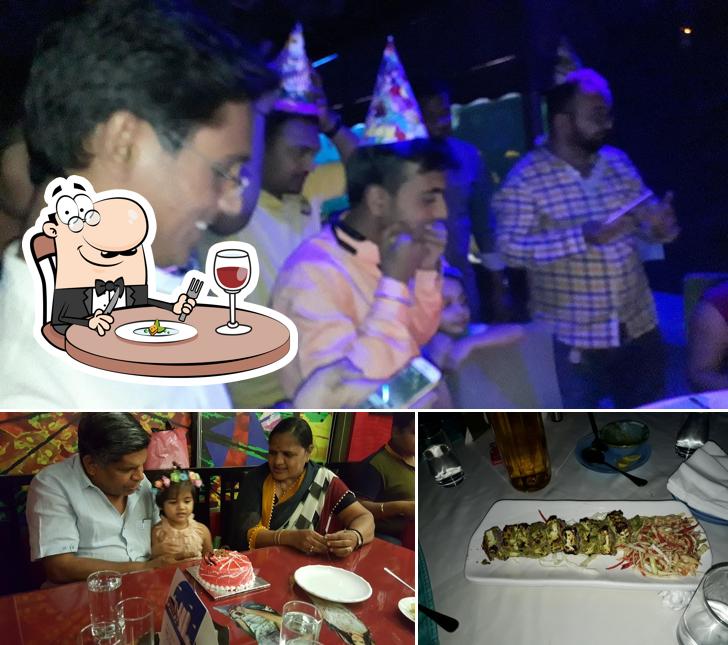 Take a look at the photo showing food and beer at Blue Restolounge