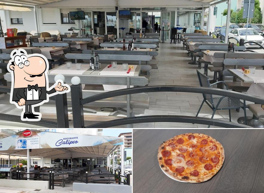 La immagine di interni e pizza da Ristorante Pizzeria Calipso