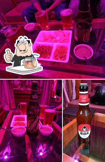 Among various things one can find drink and bar counter at Sky Bliss Cafe And Lounge