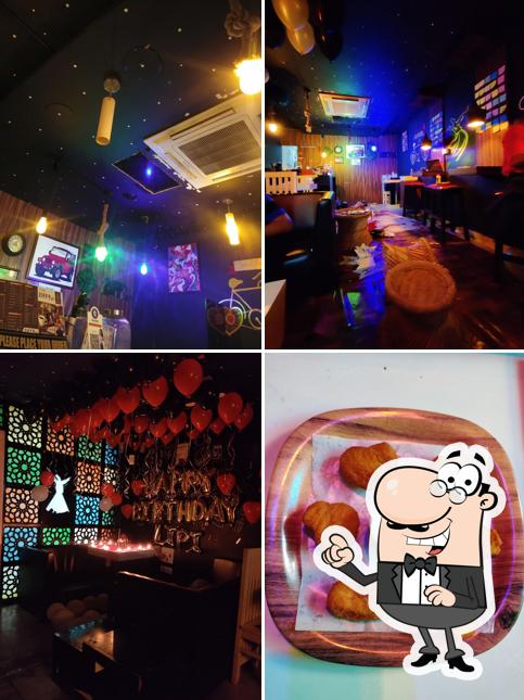 Take a seat at one of the tables at Ziffy Cafe