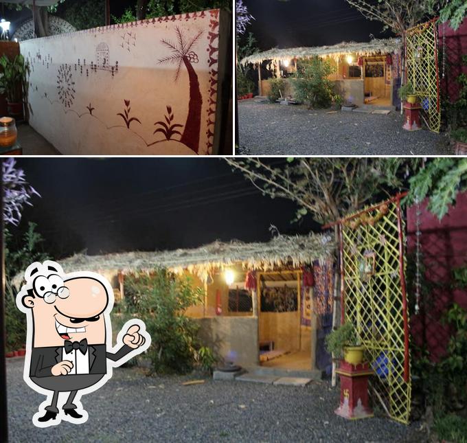 The image of exterior and interior at The Village Family Restaurant