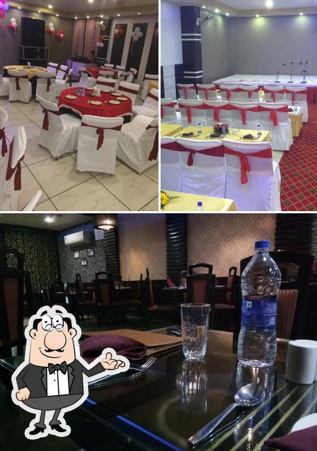 Take a seat at one of the tables at Moti Mahal Delux