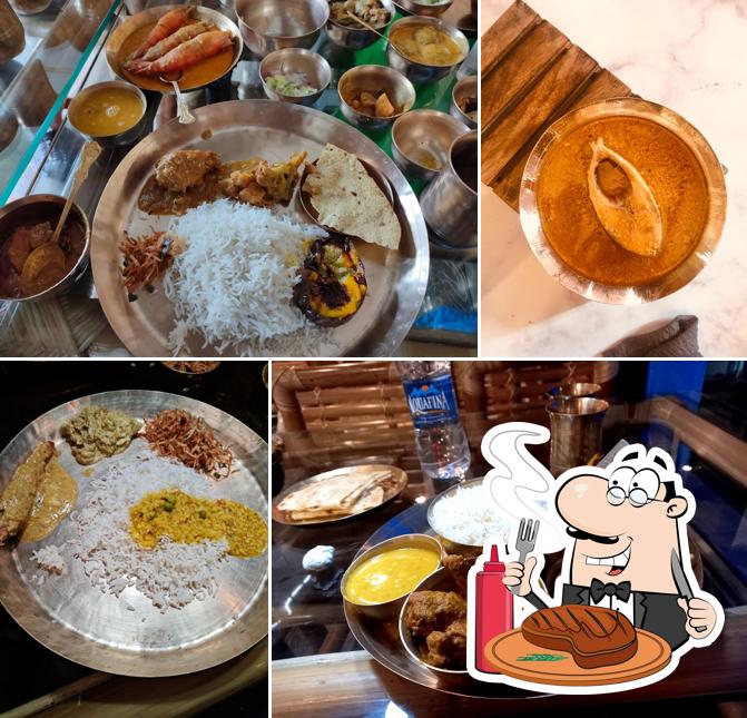 Meat dishes are served at Aami Bangali Purulia