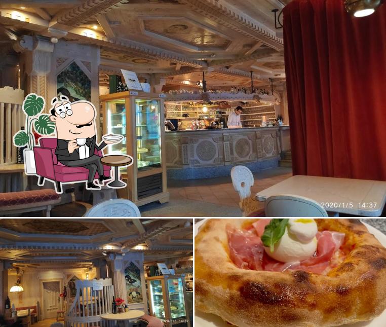 Questa è la foto che presenta la interni e cibo di La Stua Dei Ladins