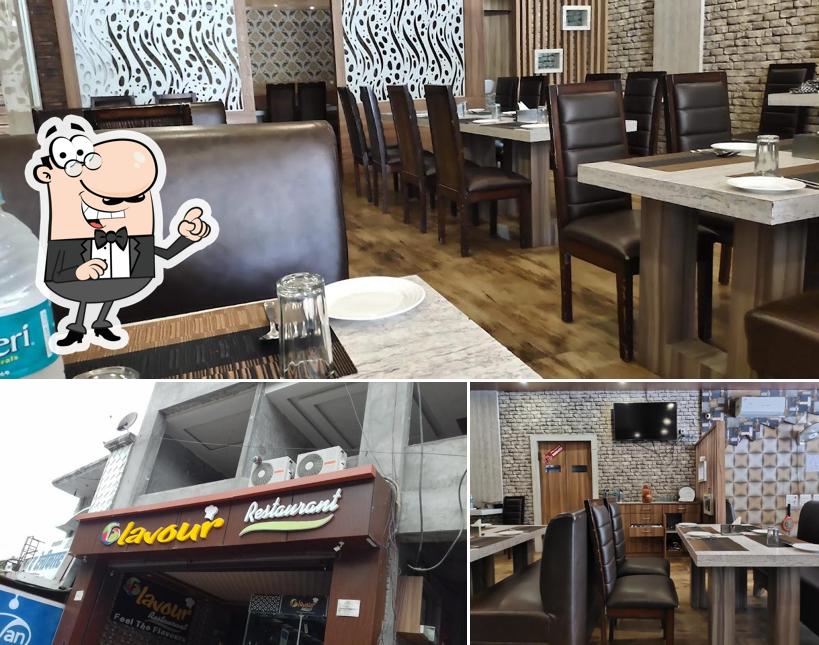 Check out the picture depicting interior and exterior at Flavour Restaurant