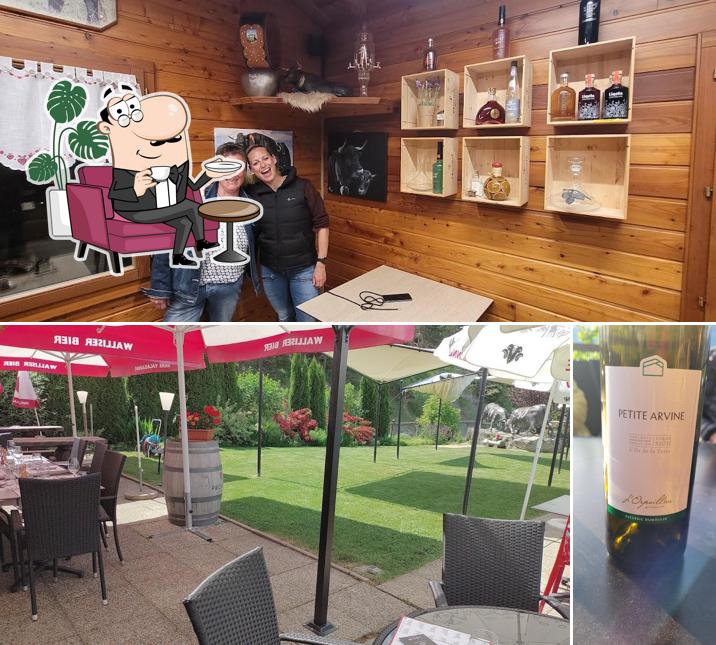 La foto della interni e vino di Relais des Reines