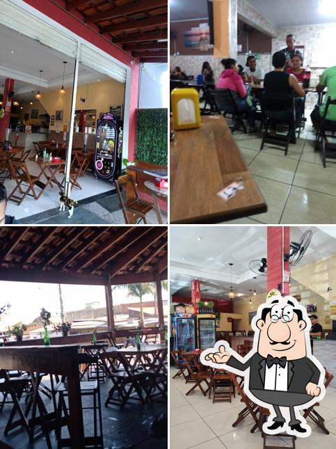 Sente em uma das mesas no Bar Restaurante do Peixe