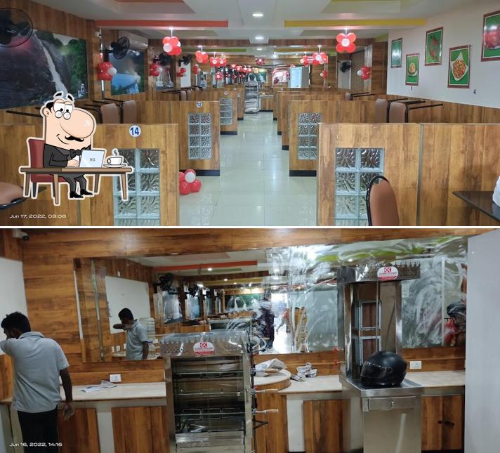 Take a seat at one of the tables at Biryanipalayam Tirupur