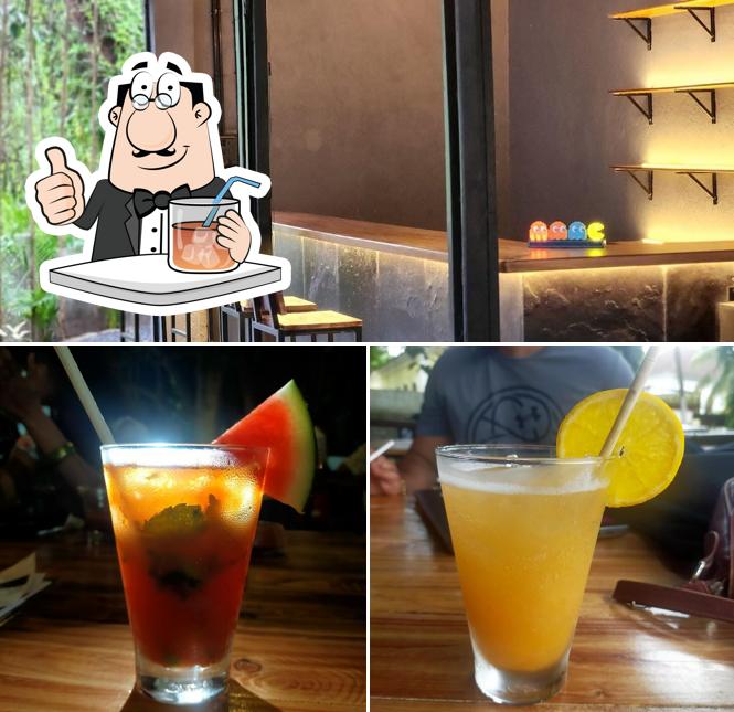 Among various things one can find drink and interior at O Poço - Bar, Kitchen & Music