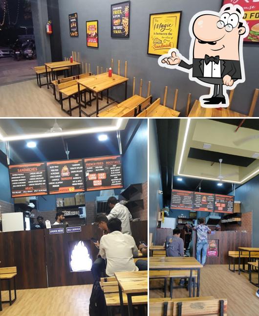 The interior of Burger Mania Shastrinagar