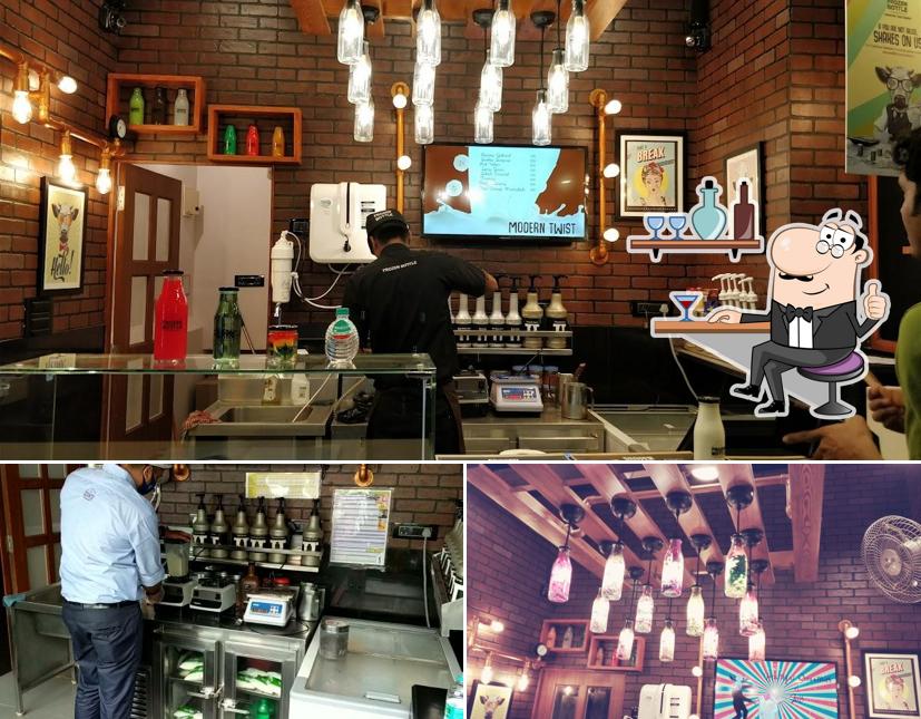 Take a seat at one of the tables at Frozen Bottle - Milkshakes, Desserts, and Ice Cream