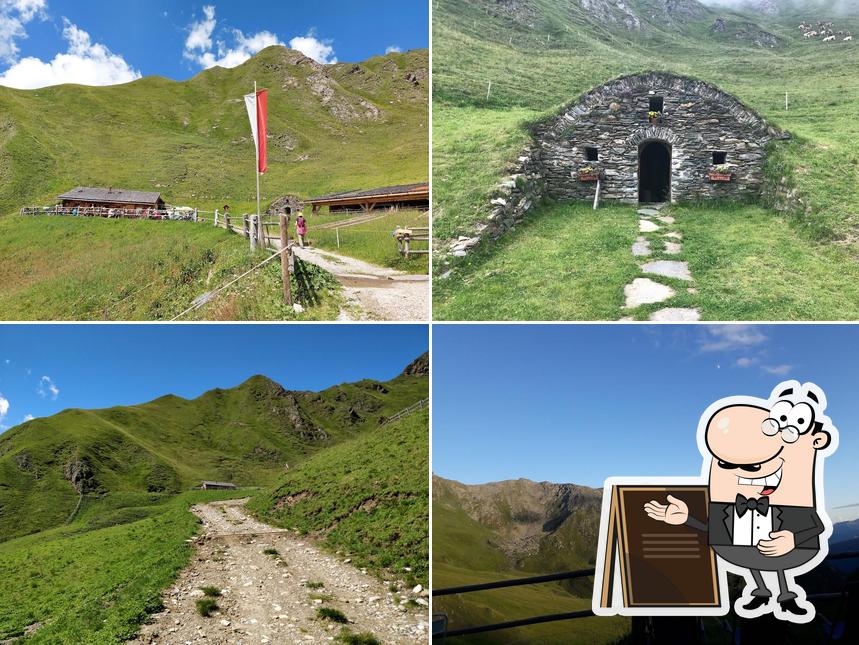 Puoi goderti l'aria fresca da seduto all'esterno di Malga Civernona
