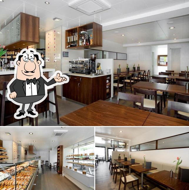 Siediti a un tavolo di Bäckerei - Konditorei - Café Meier
