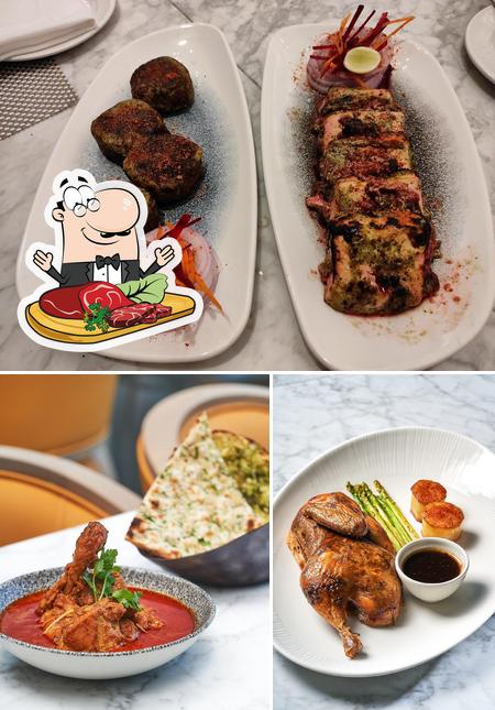 Try out meat dishes at Aura - Gateway Ahmedabad Sindhu Bhavan Road