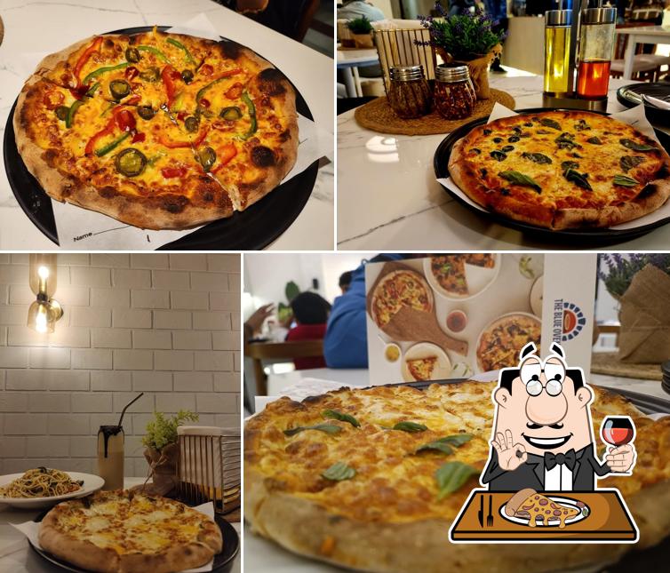 Try out pizza at The Blue Oven