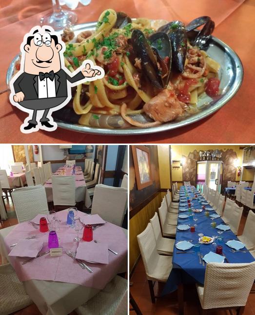 Questa è la immagine che mostra la interni e cibo di Pizzeria Astoria