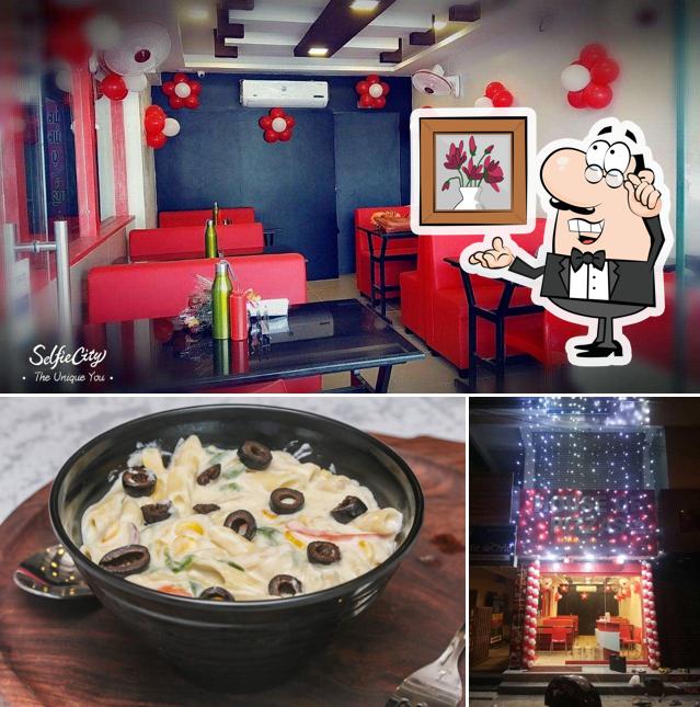 The image of HOUSE OF PIZZAS’s interior and food