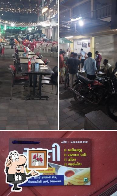 Take a seat at one of the tables at Surati Bhajipav