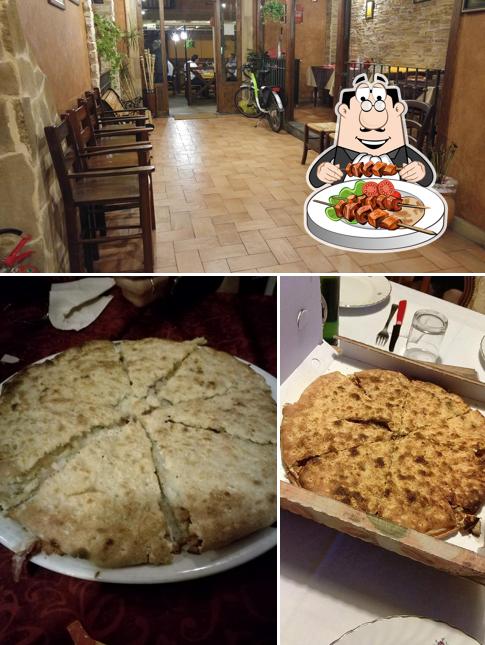 La foto della cibo e interni di Il Rustico