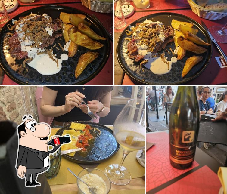 Questa è la immagine che mostra la bevanda e cibo di Taverna Magna Comunis