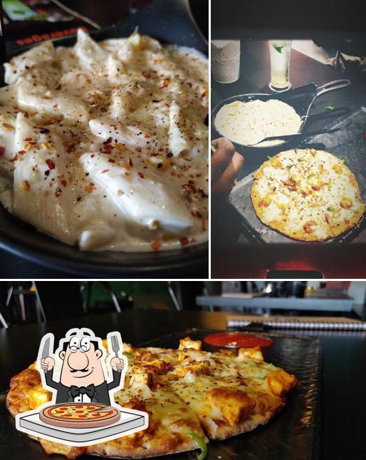 Try out pizza at The Nosh Bistro Vanasthalipuram