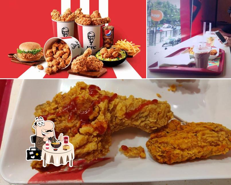 Take a look at the photo showing food and dining table at KFC