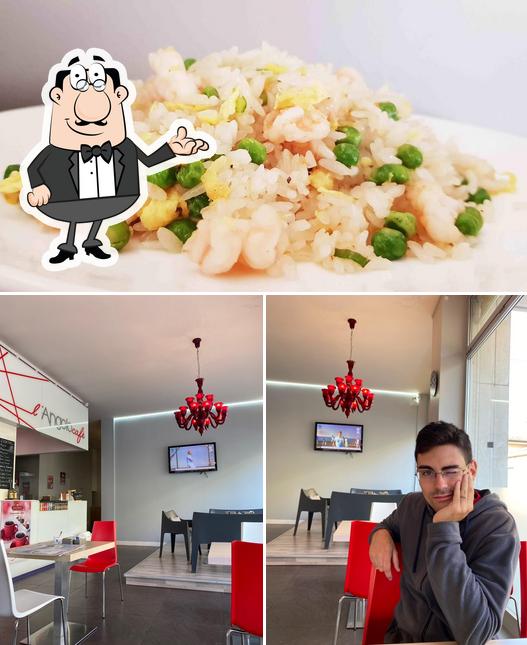 Questa è la immagine che presenta la interni e cibo di L'angolo Cafè