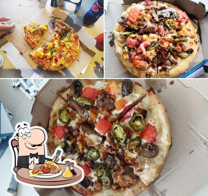 Pick pizza at Domino's Pizza Chandkheda, Ahmedabad
