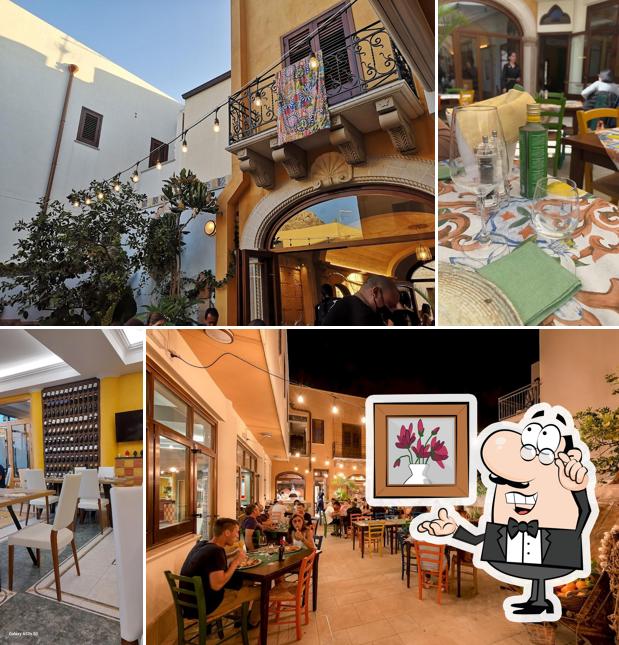Siediti a un tavolo di Ristorante Pizzeria Cortile di Cerere