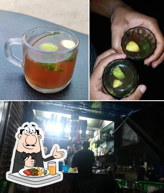 Check out the picture displaying food and bar counter at Dhuma Lemon Tea Shop Jayadev vihar