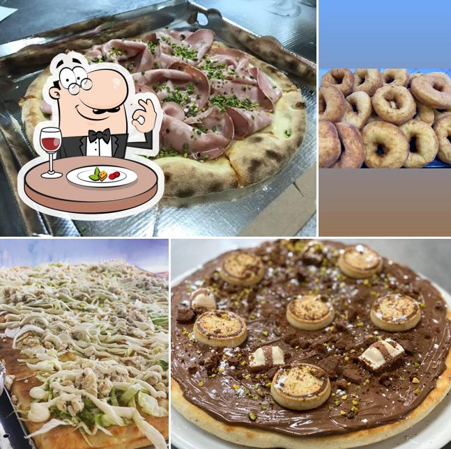 Cibo al Pizzeria- Rosticceria - paninoteca “L’incanto” Pizza Al Taglio Servizio a domicilio per il menù clicca su “sito web”