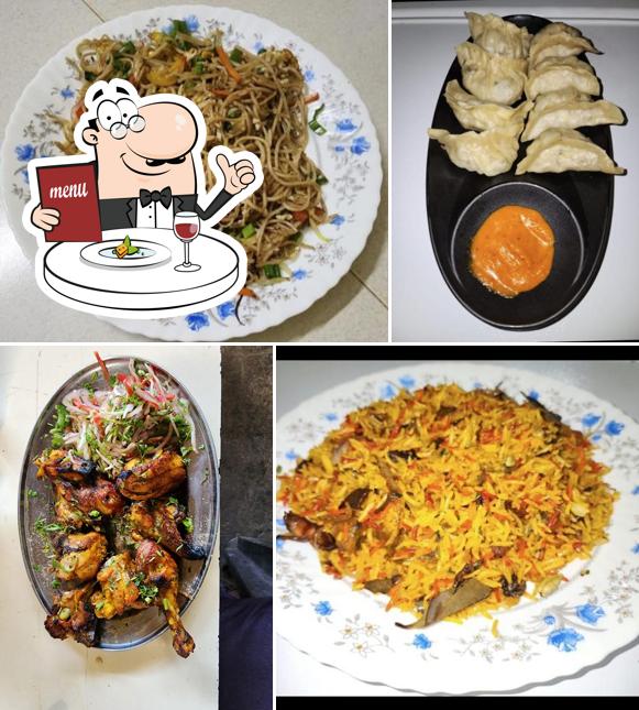 Spaghetti bolognese, gyoza, mussels and pad thai at Cafe fast food's kitchen