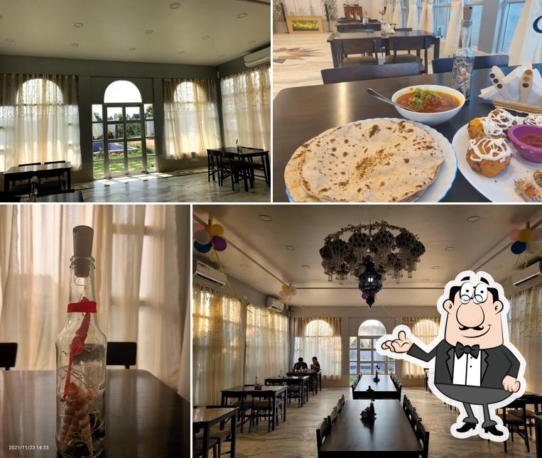 Take a seat at one of the tables at The Awja