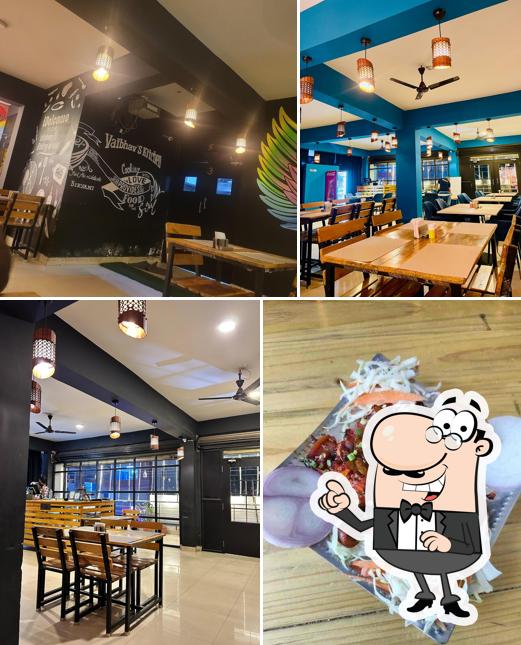 Take a seat at one of the tables at Vaibhav’S Kitchen