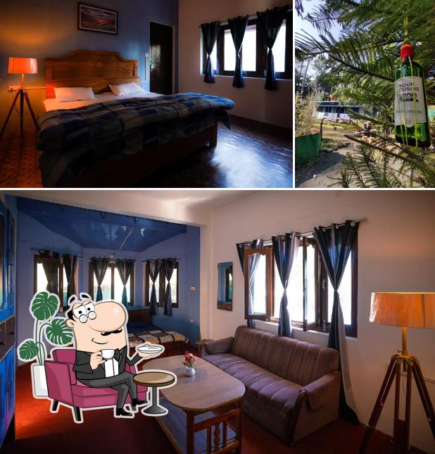 The photo of interior and alcohol at Bloom Home Stay & Cafe